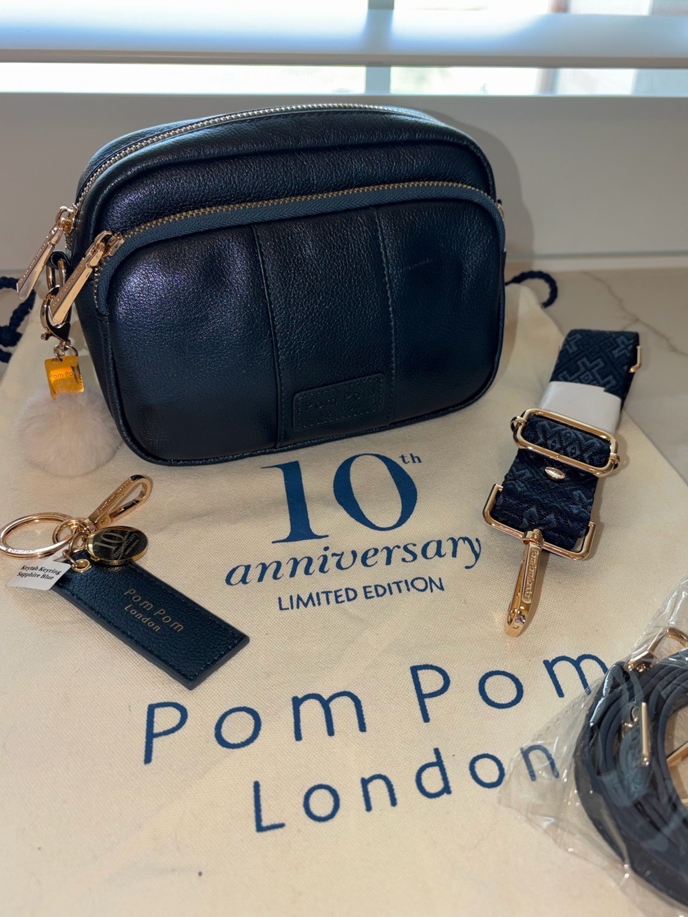 Pom Pom London Limited edition metallic blue sapphire original Crossbody bag EUC